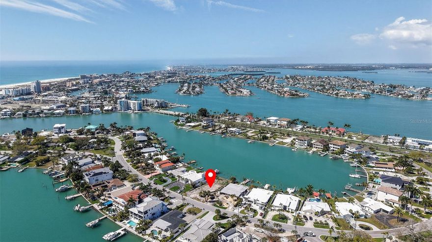 Build your dream home on this prime 0.25-acre waterfront lot in Treasure Island’s sought-after Paradise Island and create your own private coastal escape. Boasting 73 feet of direct intracoastal frontage, a protective seawall, and stunning views of Boca Ciega Bay, this property is the perfect canvas for a luxury waterfront lifestyle. Just minutes from the famous sandy beaches of Treasure Island, you can spend your days collecting shells, relaxing in a beach chair, or enjoying the lively beach atmosphere. Nearby, John’s Pass Village offers waterfront dining, boutique shopping, and entertainment, while grocery stores and everyday conveniences are just around the corner. Whether it’s boating from your backyard, watching breathtaking sunsets, or enjoying endless beach days, this is what Florida living is all about.