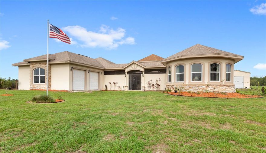 A custom-built estate that features one of the largest 'Hidden Mickeys' in the world - Welcome to this stunning Mediterranean-style home at 13023 Sweet Hill Road in Polk City, FL, nestled on an expansive 0.88-acre lot with no HOA or CDD, located just 10 minutes West of Championsgate, and 25 minutes Southwest of Walt Disney World. Built in 2019, this 4-bedroom, 4-bathroom home offers luxurious living with incredibly thoughtful design, featuring a split floor plan, seamless transitions, and abundant privacy for all residents and guests. The 'Hidden Mickey' design concept is highly functional, with the main gathering room serving as Mickey's head, the dining room serving as one ear, and the primary bathroom serving as the other. The living room features towering 18-foot tall ceilings, while the dining and primary bathroom ceilings reach 15-feet each. Just off of the main house, you'll find a tranquil screen-enclosed courtyard, well equipped for outdoor dining, entertaining, and future installation of a pool and spa, giving the space limitless potential. An adjacent one bedroom/one bathroom casita allows for complete privacy and comfort for family, friends, and other guests. Several of the many outstanding features of this home include 3 HVAC units on an Ecobee smart system (one for the guest wing, one for the main living/kitchen/dining area, and one for the primary suite,) a high-efficiency mini-split for the casita, a whole-home generator hookup, garage EV hard-wiring, complemented by a reinforced 'safe room' for added peace of mind. The chef’s kitchen features custom soft-close 42" wood cabinetry, granite countertops, and premium built-in stainless steel Bosch appliances—including a magnetic induction cooktop, built-in oven/microwave, and high-efficiency dishwasher—along with a cleverly designed, outlet-wired walk-in pantry to keep countertop appliances tucked away and out of sight. Outside, you'll find an electric metal gate restricting access to the property, a private septic & well system, an RV hook-up, along with an 18'x40' insulated and reinforced metal garage/workshop, equipped with electricity, offering endless versatility for hobbies, storage, heavy machinery, and more. Within a 5-10 minute drive, you'll have access to all of your daily essentials, including a Publix grocery store, dozens of restaurants, multiple golf courses, easy access to HWY 27 and I-4, and so much more. With it's expansive and versatile layout, optimal location, and it's pronounced attention to detail, this estate defines elegance and functionality in one exceptional package. Contact us today to schedule your private viewing!