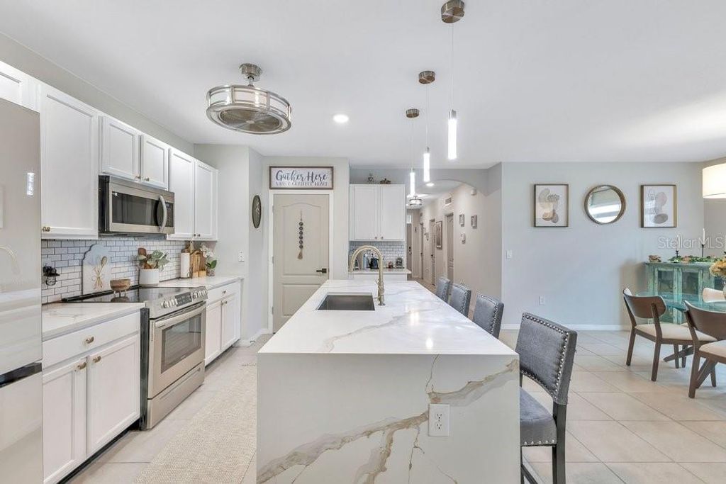 Photo of 1734 Ranger Highlands Road, Kissimmee, FL 34744 (MLS # O6379026)