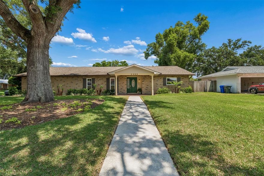 Bright, beautifully maintained home that has been lovingly cared for by the same owners for over 40 years. Pride of ownership is evident throughout, with thoughtful updates and a layout designed for comfortable everyday living and easy entertaining.The interior features beautiful engineered wood flooring, tile in all the right places, and brand new plush carpeting in one of the bedrooms, creating a warm and inviting feel. The spacious utility room offers plenty of room for laundry, storage, and added convenience.Step outside to enjoy the large pool and screen enclosure, perfect for relaxing or hosting, all while enjoying a private, well-kept outdoor setting.The oversized 2-car garage provides excellent functionality with additional storage space for tools, hobbies, or seasonal items.A truly well-maintained home with timeless care and character, ready for its next chapter.