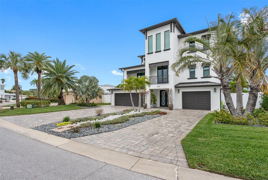 OVERLOOKING A WIDE BAY JUST OFF THE INTRACOASTAL WATERWAY, THIS 2022 CUSTOM COASTAL MODERN HOME PROVIDES THE IDEAL SETTING TO BEGIN LIVING THE FLORIDA LIFESTYLE OF YOUR DREAMS TODAY.  Built by a Gulf Coast premiere builder, this stunning 4,408-sf all-masonry home features built-to-last construction, a spacious contemporary 4-bedroom floorplan and well-appointed interior spaces that blend seamlessly with expansive covered decks overlooking an ultramodern outdoor living area, custom pool & spa, lush landscaping, tranquil bay waters and spectacular evening sunsets. Situated on a large waterfront lot (.26 acres) with 60 feet of waterfrontage, composite dock, boat and jet ski lifts, boaters will reach Johns Pass and the Gulf of Mexico in approximately 15 minutes.  For beach lovers, you are just a short stroll to the sand and surf. Located in the town of North Redington Beach halfway between Florida's world-famous Clearwater & St Pete beaches, this exquisite property provides all the benefits of up-to-date construction standards and contemporary home design to provide an unapparelled waterfront living experience that is available for you to enjoy right now. Shown by appointment only, no signage.