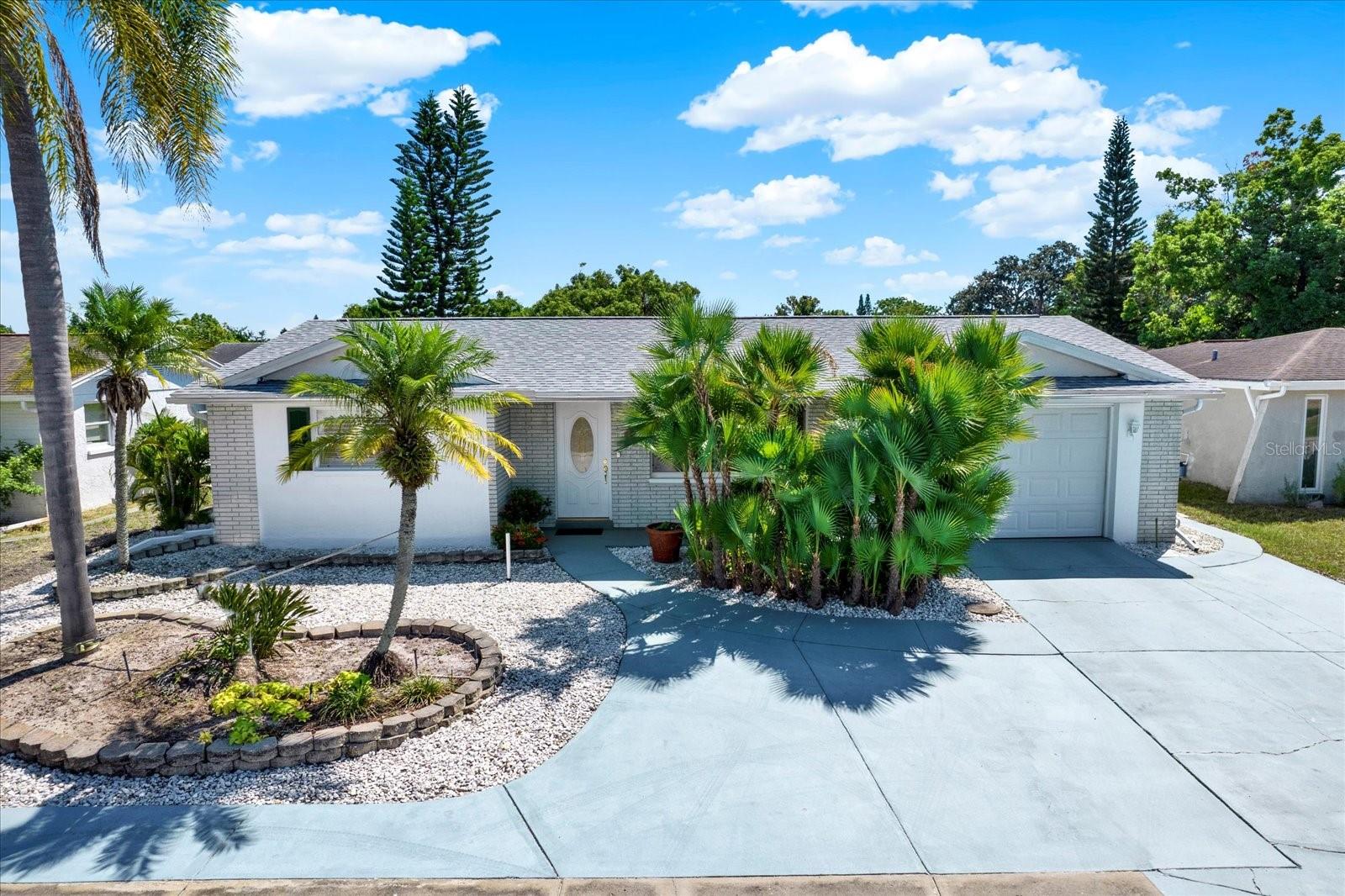 Florida Lifestyle Awaits in this Pool Home with Major Updates! Enjoy the comfort and convenience of Florida living every day at 9024 Lido Lane, a beautifully maintained home with everything you want already done. Imagine relaxing by your own beautiful private pool, recently resurfaced with in January 2025, perfect for entertaining or quiet afternoons in the sun. Major updates bring total peace of mind with a brand new roof in October 2023 and a new HVAC system in June 2024. Inside, spacious living areas flow easily into a bright kitchen and comfortable bedrooms, plus a versatile Florida Room that can easily become your office or a third bedroom. With no HOA fees and no CDDs, low maintenance landscaping, and a prime location close to shopping, dining, medical centers, and the Gulf Coast Beaches, this home blends lifestyle, convenience, and value. Move fast because a pool home like this will not stay on the market long.