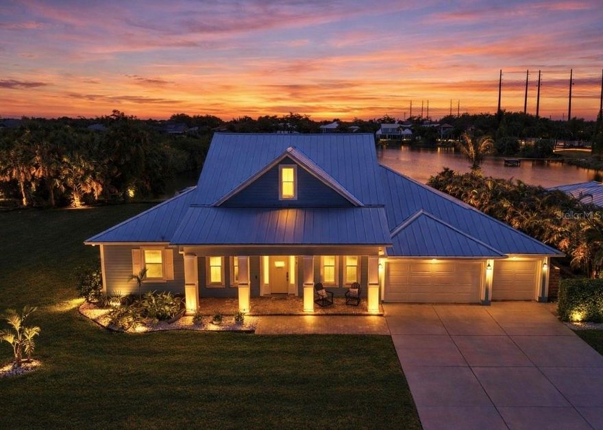 Welcome to your personal paradise, where the allure of waterfront living meets high-end luxury NO FLOOD INSURANCE required. A rare opportunity to live in a Key West inspired private community of Key West Landings on the Alafia River off of Tampa Bay. This gated oasis of only 18 homes, with deeded boat slips offers a lifestyle that dreams are made of. Imagine stepping into a world where palm trees sway gently in the breeze, grand oaks stand majestically, and the tranquil waters of the Alafia River invite you to explore.

This stunning executive home boasts a coveted boat slip with lift, setting the stage for sunset cruises and boating adventures. The Alafia River offers a unique Old Florida charm with several water front restaurants. Only minutes to Tampa Bay with the contrast of skyline views, sandy beach islands and entertainment on the Riverwalk. This is a true boaters paradise.

Nature is calling, unwind on this oversized lot with views of a private 4 acre lake stocked and ready for bass fishing. Bird lovers will enjoy the endless variety and your own aviary off of the lanai.