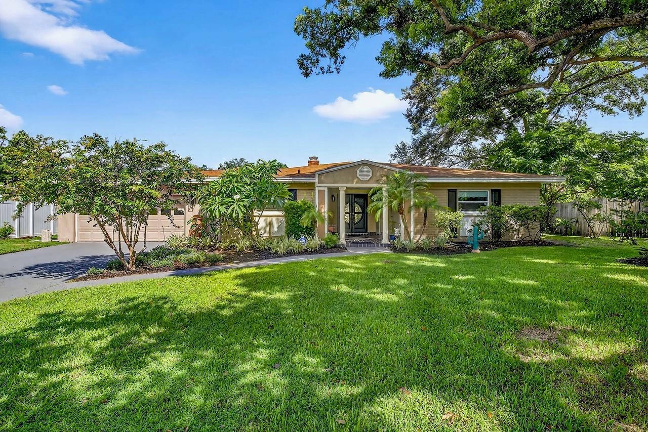 BEAUTIFULLY UPDATED AND MOVE-IN READY, 3 Bedroom, 2
Bathroom Home, with Oversized 2 Car Garage and Expansive
Homesite! MAJOR UPDATES: NEW ROOF (2018), NEW A/C
SYSTEM (2023), NEW WATER HEATER (2022), NEW RANGE &
DISHWASHER (2025), NEW WASHER (2024), NEW
MICROWAVE (2023), COMPLETELY RENOVATED PRIMARY
BATHROOM (2025), UPDATED SECONDARY BATHROOM
(2025), BEAUTIFUL NEW ENGINEERED WOOD FLOORS IN THE
BEDROOMS AND HALLWAY, HURRICANE RESISTANT
WINDOWS for enhanced safety and durability! COMFORTABLE
LIVING SPACES: The living room and great room feature a cozy
double-sided woodburning FIREPLACE, engineered WOOD FLOORS,
and Beautiful French doors with Built-in Blinds, that open to your extralarge
patio – ideal for entertaining and relaxing! The spacious kitchen
features STAINLESS STEEL APPLIANCES, Center Island with
Seating, Abundant Cabinet Storage with convenient pull-out shelves and
pass through to the great room! OUTDOOR PARADISE: Nearly a
QUARTER-ACRE HOMESITE with Decorative Concrete Fencing,
plenty of space for a swimming pool, play area, and your favorite
outdoor activities, newly refurbished lawn sprinkler system, Large
STORAGE SHED - perfect for tools, toys, and outdoor equipment, and
a Charming Covered Front Porch! CONVENIENT GARAGE
FEATURES: Oversized 2-car garage, Loads of Built-in Storage
Cabinets, Washer, Dryer, Laundry Sink, & Automatic Door Opener! Also included: ADT Security System with Sensors on every window and door, plus Doorbell and Front Yard Cameras! Enjoy the best of Tampa living – Centrally located and within close
proximity to Downtown Tampa's Business and Entertainment District,
Water Street/Channelside, Armature Works on the Hillsborough River,
Water Works Park, Tampa International Airport, International Mall,
Dining Destinations, Raymond James Stadium, Performing Arts Center,
Grocery Stores and so much more! NO HOA or CDD Fees!