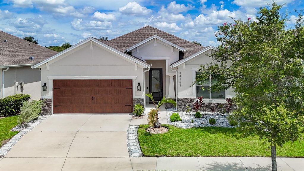 Photo of 34163 Radley Way, Wesley Chapel, FL 33545 (MLS # TB8394820)