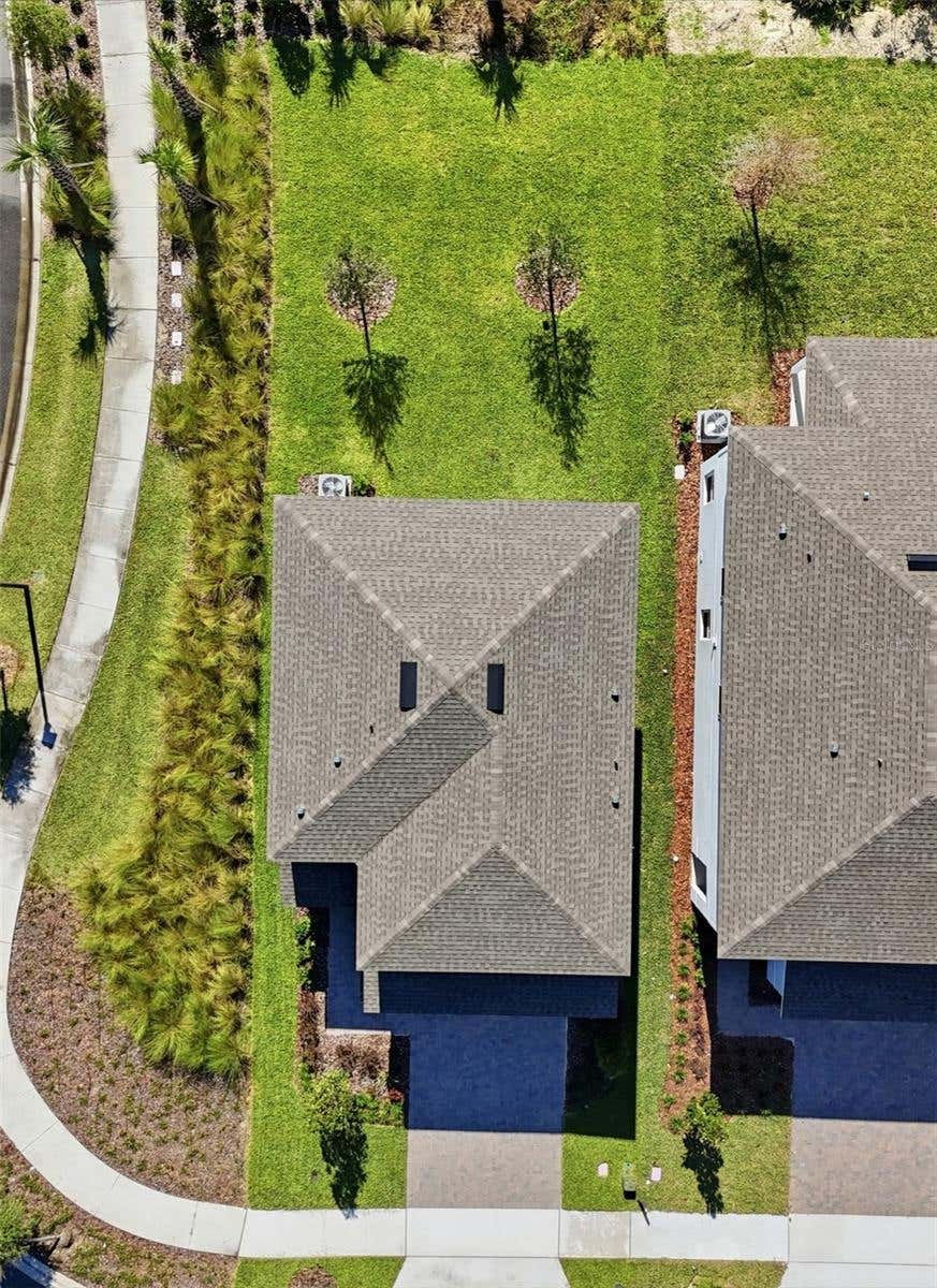 Photo of 5000 Bear Lake Loop, Deland, FL 32724 (MLS # O6428112)