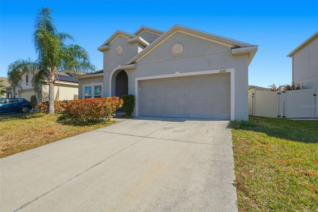 Photo of 12327 Sawgrass Prairie Loop, Orlando, FL 32824 (MLS # O6380240)