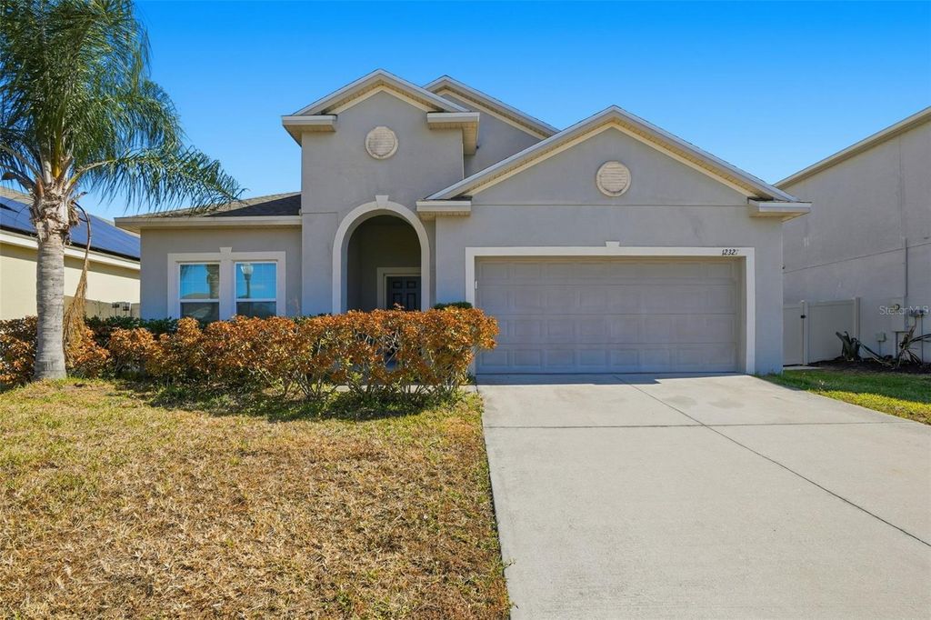 Photo of 12327 Sawgrass Prairie Loop, Orlando, FL 32824 (MLS # O6380240)