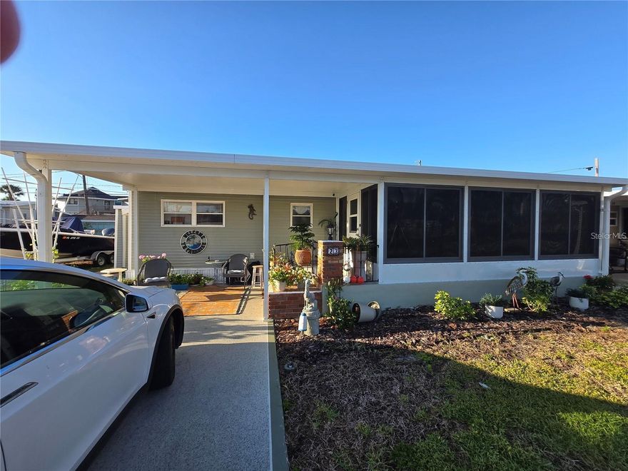 LOCATION, LOCATION, LOCATION — BEACH LIVING WITH FLEXIBLE FINANCING! Seller will consider a land contract with half down, making this an incredible opportunity to own a piece of Manasota Key paradise. Just steps from the sand, this beautifully updated 2-bedroom, 2-bath home is located in the highly sought-after Gulf-to-Bay community, where the beach truly feels like your backyard. Enjoy morning coffee with ocean breezes and unwind with stunning Gulf sunsets—this is the coastal lifestyle buyers dream about. Inside, the home has been tastefully updated for comfort and ease, featuring a new A/C system, newer appliances, and sleek quartz countertops—perfect for low-maintenance, move-in-ready living. Positioned on the Lemon Bay side, residents enjoy access to a private boat ramp, waterfront pavilion, and a welcoming clubhouse that creates a true sense of community. This resident-owned 55+ Gulf-to-Bay cooperative spans approximately 7.5 acres and includes private beach access—an incredibly rare find on Manasota Key. Sold turnkey and ready to enjoy immediately. Beach… boating… sunsets… this is the one everyone waits for.