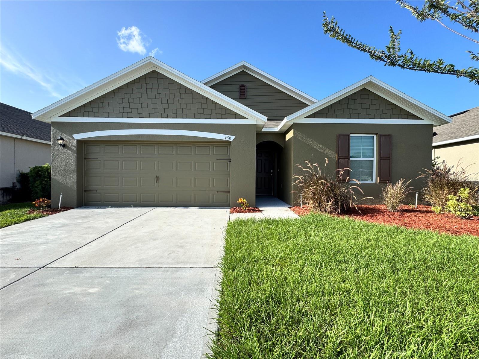 Wanted to share some highlights about this home: It features an open floor plan, perfect for cooking in the kitchen while entertaining. The large master bedroom is separated from the other three bedrooms. You really just have to walk this amazing floor plan to fall in love. This home offers the perfect blend of comfort and modern living at the sought-after Squires Grove community. Its location is another key feature, with proximity to LEGOLAND and Cypress Gardens Blvd., plus a short drive to Bok Tower and various shopping and dining options. Situated on a prime lot with tranquil pond and woods views, this home offers the ultimate in privacy with no rear neighbors. Plus, enjoy the convenience of an excellent location close to everything Winter Haven offers, including Legoland, with easy access to Hwy 17 and Hwy 27. Don't miss your chance to call this stunning Winter Haven retreat home. Schedule your showing today and start living the Florida lifestyle you've always dreamed of! House has new carpets , fresh paint inside and outside .