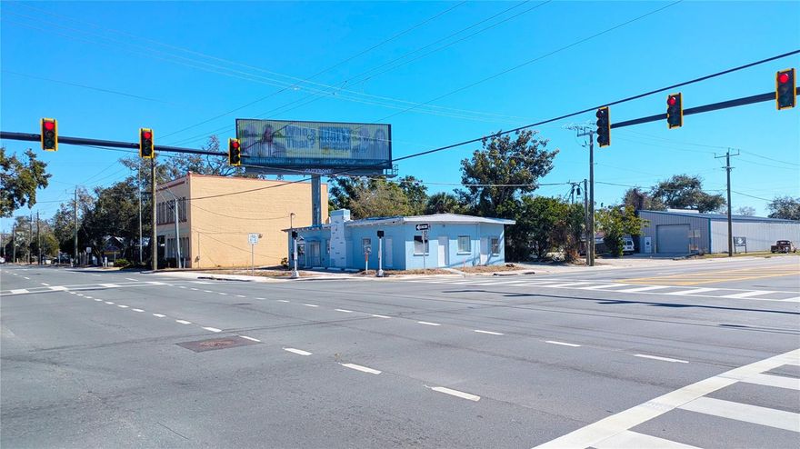 This prominent, high-visibility corner site at SR 64 east-bound (6th Avenue East) to I-75, and 9th Street East which takes you south to Tropicana facility and US 301 in Bradenton features a ±1,922 SF shell building ready to be renovated and customized to suit a retail or office user.

The signalized hard-corner intersection includes a marked crosswalk, providing convenient pedestrian access from the neighboring apartment community and surrounding businesses. The property benefits from two established curb cuts—one along 7th Avenue East and one along 9th Street East—enhancing circulation and accessibility.

Additionally, the on-site high-visibility billboard generates $15,000 per year minimum with additional potential through percentage rents further strengthening the property’s investment appeal.