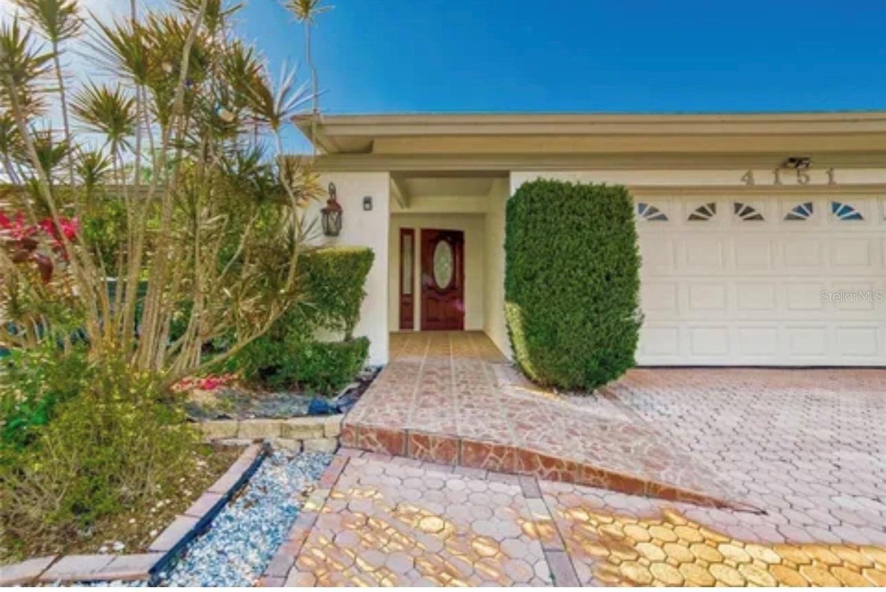 Your private resort—minus the checkout time. Live where every day feels like vacation in this 3-bedroom, 2-bath, 2,348 sq. ft. Safety Harbor stunner. Inside, enjoy spacious living and family rooms, a sun-soaked Florida room with pool and garden views, and a gourmet kitchen with granite countertops, generous prep space, and a wine cooler for those “just because” pours. Partially furnished—yes, that means a pool table for game nights, flat-screen TVs so you’re streaming from day one, beds and a comfy couch. Outside, your own private oasis awaits with a screened saltwater pool, paver patio, and lush terraced gardens, all maintained for you. Just minutes from famous Downtown Safety Harbor, rated #1 in small-town charm in America, you’ll be surrounded by boutique shops, farmers markets, cozy cafés, and award-winning restaurants. Add in top-rated schools, scenic parks, and waterfront trails, and you’ve got the perfect blend of luxury, convenience, and community. Welcome to the good life—no checkout required.