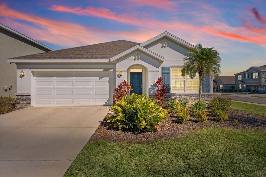 Welcome to 5121 Sultana Cove, Bradenton, FL,  a well-maintained 3-bedroom, 2-bath home situated on a CORNER LOT at the end of a CUL-DE-SAC in the desirable Solera at Lakewood Ranch community and NOT located in a flood zone. This home offers an open-concept floor plan ideal for both everyday living and entertaining. The kitchen features stainless steel appliances, granite countertops, a large center island, and ample cabinetry. ALL appliances convey, including WASHER and DRYER, and BLINDS are included, making this home truly move-in ready. The primary suite provides a private retreat with an en-suite bath, while two additional bedrooms offer flexibility for guests, a home office, or family living. Situated on an oversized 9,148 sq ft corner lot, the home offers added privacy and outdoor potential. Residents enjoy resort-style amenities, including a community pool, playground, and clubhouse. Conveniently located, the home is approximately 5 minutes from I-75, the post office, grocery stores, and medical facilities. Main Street at Lakewood Ranch and University Town Center (UTC) are about 10–12 minutes away, offering shopping, dining, and entertainment. The Premier Sports Campus and nearby library are just 5 minutes away. Downtown Bradenton is approximately 20 minutes, while Florida’s world-famous beaches—including Anna Maria Island, Lido Key, Siesta Key, and Longboat Key—are within 30–40 minutes. Schedule your showing today!