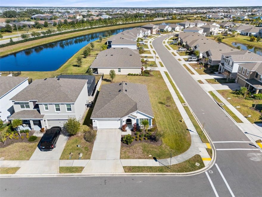 Welcome to 5121 Sultana Cove, Bradenton, FL,  a well-maintained 3-bedroom, 2-bath home situated on a CORNER LOT at the end of a CUL-DE-SAC in the desirable Solera at Lakewood Ranch community and NOT located in a flood zone. This home offers an open-concept floor plan ideal for both everyday living and entertaining. The kitchen features stainless steel appliances, granite countertops, a large center island, and ample cabinetry. ALL appliances convey, including WASHER and DRYER, and BLINDS are included, making this home truly move-in ready. The primary suite provides a private retreat with an en-suite bath, while two additional bedrooms offer flexibility for guests, a home office, or family living. Situated on an oversized 9,148 sq ft corner lot, the home offers added privacy and outdoor potential. Residents enjoy resort-style amenities, including a community pool, playground, and clubhouse. Conveniently located, the home is approximately 5 minutes from I-75, the post office, grocery stores, and medical facilities. Main Street at Lakewood Ranch and University Town Center (UTC) are about 10–12 minutes away, offering shopping, dining, and entertainment. The Premier Sports Campus and nearby library are just 5 minutes away. Downtown Bradenton is approximately 20 minutes, while Florida’s world-famous beaches—including Anna Maria Island, Lido Key, Siesta Key, and Longboat Key—are within 30–40 minutes. Schedule your showing today!