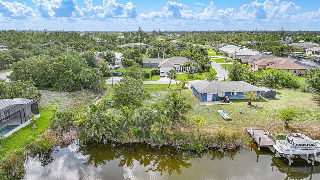 Photo of 9511 Honeymoon Drive, Port Charlotte, FL 33981 (MLS # D6141879)