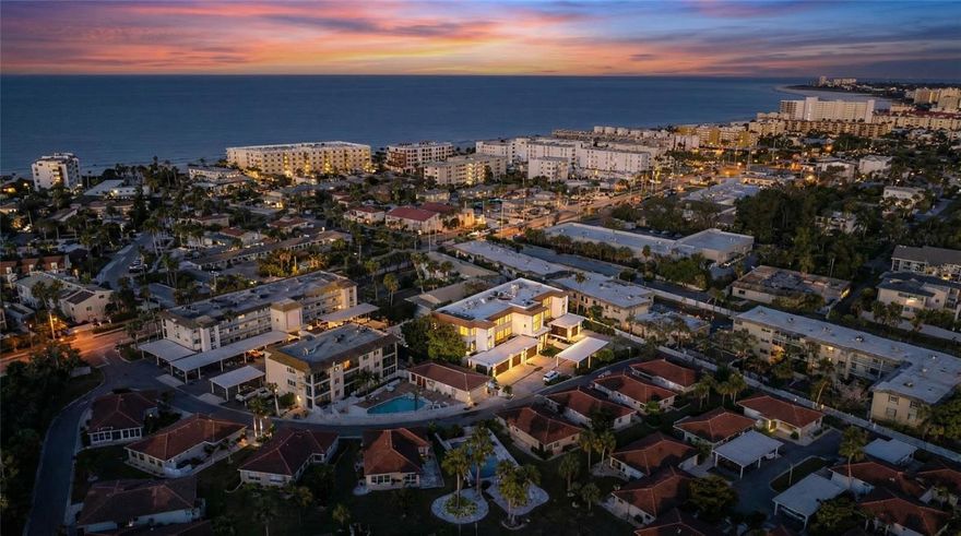 Welcome to Vista Hermosa! Full remodeled, 2-bedroom, 2-bathroom condo located directly across the street from the world-renowned Crescent Beach on Siesta Key. This second-floor unit (with elevator access) showcases an extensive list of high-end upgrades and thoughtful renovations that make it stand out above the rest. Step inside to find an impact-rated thermal glass door, porcelain tile in the bathrooms, fresh paint, flat ceilings, LED lighting, and luxury waterproof vinyl flooring throughout. The kitchen has been completely redesigned with solid wood, soft-close cabinetry, quartz countertops, a recessed black sink, designer switch plates, and a coordinated Samsung stainless steel appliance package. A center island with drawers offers added prep space and storage, while the commercial hood above the stove, sleek under-cabinet lighting, and modern fixtures complete the contemporary look. Both bathrooms have been remodeled with tiled showers, new vanities, updated fixtures, new Panasonic fans, and a Kohler toilet. Other improvements include new baseboards, upgraded outlets, partial new ductwork, a newer HVAC system , and three impact-rated windows. The bedrooms also feature elegant crown molding, adding a refined touch to these relaxing retreats. This condo makes for an ideal Siesta Key beach home with incredible accessibility to everything you could want including popular shops, restaurants, and the white sand shoreline just steps away. It’s also a fantastic investment opportunity, offering a worry-free experience with no storm damage, on-site management, and covered parking. Enjoy peace of mind, style, and a walkable coastal lifestyle in this beautifully finished condo in one of Siesta Key’s most desirable communities.