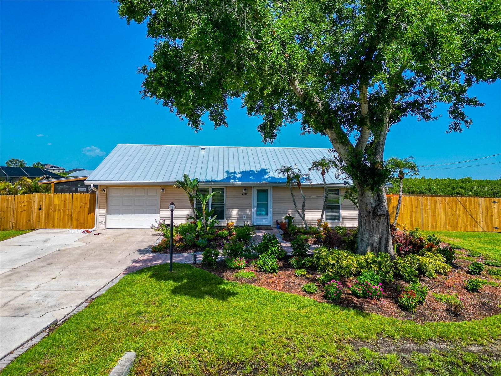 Welcome to a rare waterfront opportunity with no HOA and no deed restrictions, located on a quiet cul-de-sac in unincorporated Manatee County. This unique property includes a 2-bedroom, 1-bath main home with 1,602 square feet of living space, plus a separate efficiency/in-law suite offering 2 bedrooms, 1 bath, and an additional 366 square feet — ideal for extended family or guests.
The main house features an enclosed lanai with new no-see-um screening and an HVAC system that’s just four years old. The efficiency suite has its own screened lanai and is equipped with a brand-new two-head ductless mini-split HVAC system. Recent updates throughout the property include new kitchen cabinetry with quartz countertops, updated bathrooms with new toilets, vanities, and showers, along with new appliances and a new water heater.
Out back, you'll find a private dock with a boat lift that was replaced three years ago, including four new pilings, motors, bunks, a canopy, and remote control operation. The backyard is a front-row seat to Florida’s natural beauty, where manatees, dolphins, and ospreys are regular visitors. For anglers, the dock provides access to snook, redfish, trout, mangrove snapper, flounder, and more. Best of all, you're just a 15-minute boat ride to the confluence of Tampa Bay, Sarasota Bay, and the Manatee River.
Whether you're looking for multi-generational living, guest accommodations, or potential rental income, this property offers flexibility, freedom, and direct access to the best of Florida waterfront living.