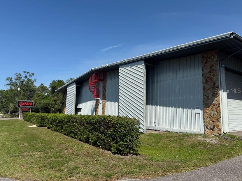 Prefinished metal, one-story, warehouse building constructed in 1985. The building contains a total 16,000 SF MOL, based on public records and confirmed with physical measurements. The building is split between two leases. Average condition.
