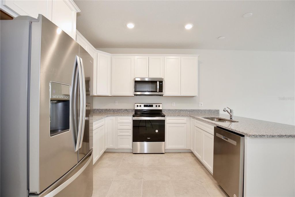Photo of 5586 Pineland Run, Orlando, FL 32829 (MLS # O6404013)