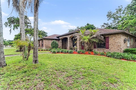 Photo of 6040 Spruce Point Circle, Port Orange, FL 32128 (MLS # O6416214)