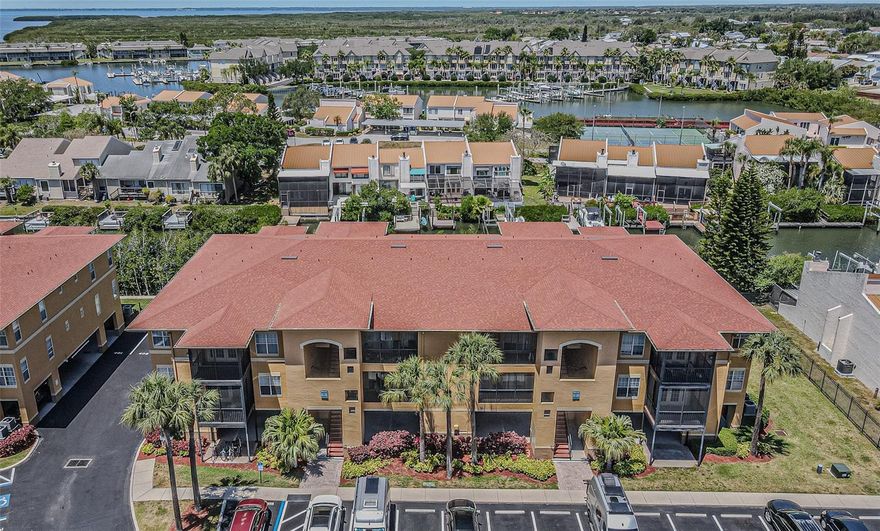 This top-floor, 2-bedroom, 2-bathroom condo in the gated Beachwalk community features a split floor plan that has been entirely refreshed with new interior paint. The open living and dining area connects directly to a private screened balcony, while the practical kitchen is anchored by a suite of brand-new appliances, eliminating the need for immediate upgrades. The layout includes convenient in-unit laundry and two primary suites, each with its own walk-in closet.

The Beachwalk community provides a low-maintenance lifestyle with comprehensive amenities, including a resort-style pool, fitness center, clubhouse, and a private boardwalk winding through a mangrove nature preserve. Positioned just off Memorial Highway, the property offers immediate access to the Veterans Expressway, placing Tampa International Airport and the Westshore Business District just minutes away.