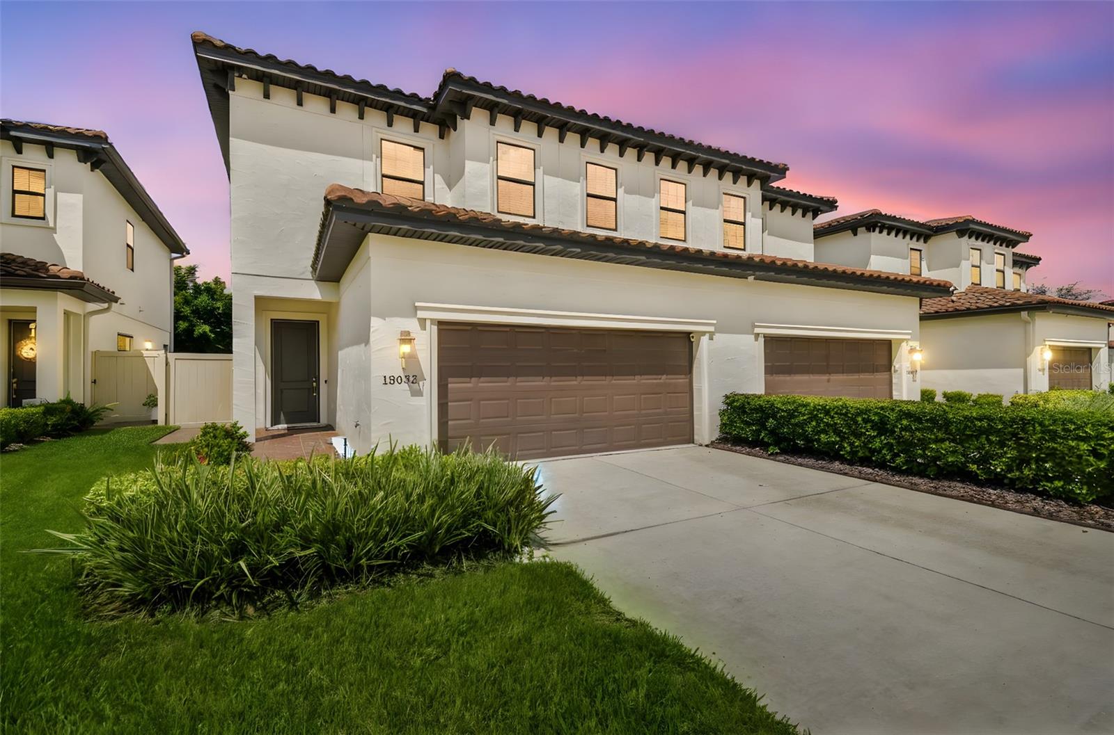 One or more photo(s) has been virtually staged. Welcome to 13032 Sanctuary Village Lane, a stunning 4-bedroom, 2.5-bath luxury townhome offering 2,421 sq ft of heated living space in one of Tampa’s most desirable gated communities. Built in 2020 with a timeless tile roof and elegant architectural details, this residence blends modern sophistication with thoughtful upgrades throughout. Rich hardwood floors flow seamlessly across the entire home, complemented by quartz countertops in the kitchen and baths. The gourmet kitchen is a showpiece, featuring premium stainless-steel appliances, a spacious food pantry, and custom cabinetry. The open-concept design leads to a screened-in back porch with solar shades, perfect for relaxing in privacy. Additional enhancements include custom closets in every room, crown molding throughout, a loft conversion creating a true fourth bedroom, and a wireless security system with cameras for peace of mind. The garage is equally impressive with industrial-grade epoxy flooring, overhead storage racks, and a 2024 belt-drive opener with battery backup. Anti-theft window film and reinforced door jams add an extra layer of security, while brick pavers and an attic drop-down ladder offer both style and function. Located just minutes from Carrollwood Village Park, top-rated schools, shopping, dining, and major highways, this home delivers the perfect blend of luxury, convenience, and community. Don’t miss the opportunity to own this exceptional property in a prime location, make your appointment today!