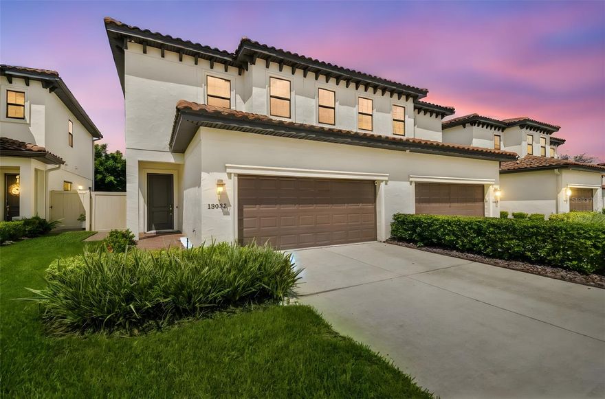 One or more photo(s) has been virtually staged. **NEW PRICE** Welcome to 13032 Sanctuary Village Lane, a stunning 4-bedroom, 2.5-bath luxury townhome offering 2,421 sq ft of heated living space in one of Tampa’s most desirable gated communities. Built in 2020 with a timeless tile roof and elegant architectural details, this residence blends modern sophistication with thoughtful upgrades throughout. Rich hardwood floors flow seamlessly across the entire home, complemented by quartz countertops in the kitchen and baths. The gourmet kitchen is a showpiece, featuring premium stainless-steel appliances, a spacious food pantry, and custom cabinetry. The open-concept design leads to a screened-in back porch with solar shades, perfect for relaxing in privacy. Additional enhancements include custom closets in every room, crown molding throughout, a loft conversion creating a true fourth bedroom, and a wireless security system with cameras for peace of mind. The garage is equally impressive with industrial-grade epoxy flooring, overhead storage racks, and a 2024 belt-drive opener with battery backup. Anti-theft window film and reinforced door jams add an extra layer of security, while brick pavers and an attic drop-down ladder offer both style and function. Located just minutes from Carrollwood Village Park, top-rated schools, shopping, dining, and major highways, this home delivers the perfect blend of luxury, convenience, and community. Don’t miss the opportunity to own this exceptional property in a prime location, make your appointment today!