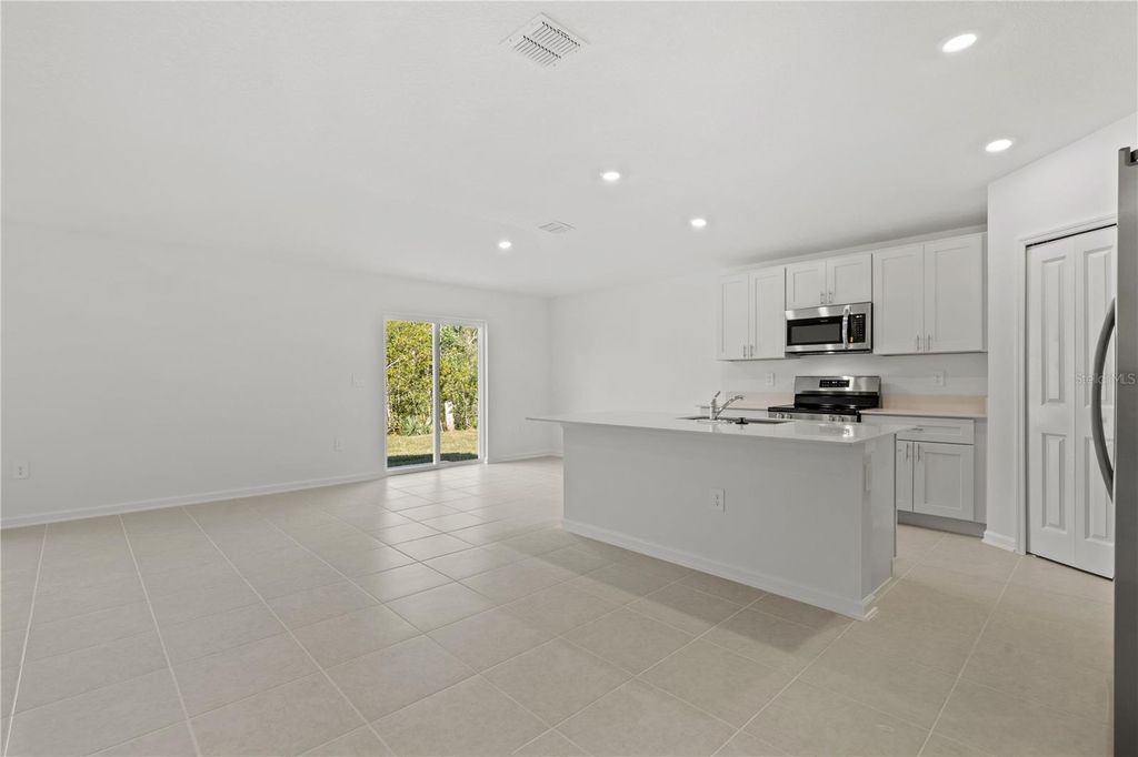 Photo of 4838 Yellow Elder Way, Kissimmee, FL 34758 (MLS # O6347439)