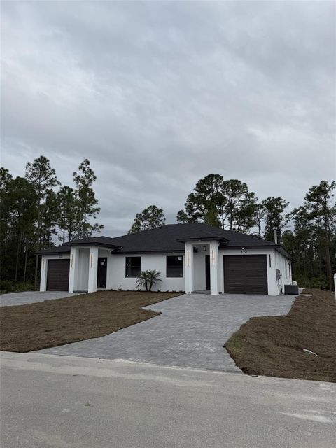 Photo of 321 Urbana Street, Lehigh Acres, FL 33972 (MLS # TB8484769)