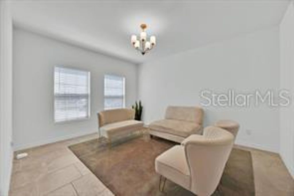 Photo of 358 Hamlet Loop, Davenport, FL 33837 (MLS # O6388415)