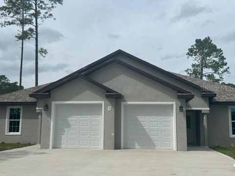 8 REGINA LANE A,B PALM COAST FL 32164