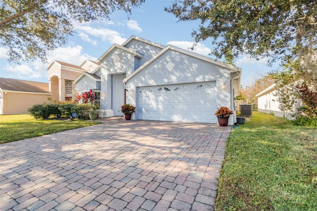 Photo of 5070 Hook Hollow Circle, Orlando, FL 32837 (MLS # O6362686)
