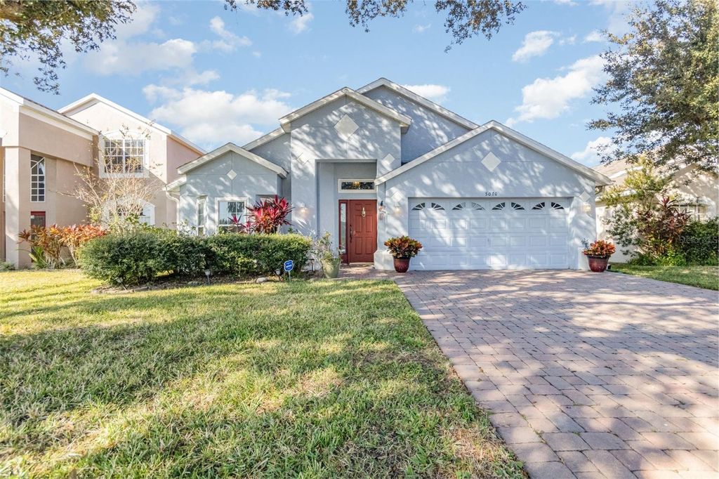 Photo of 5070 Hook Hollow Circle, Orlando, FL 32837 (MLS # O6362686)