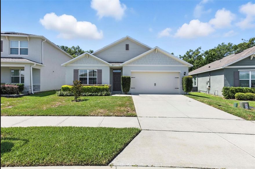 the heart of Mount Dora! This spacious, light-filled property features an open-concept floor plan with a modern kitchen equipped with stainless steel appliances, quartz-style countertops, white cabinetry, and a large island. Freshly painted in 2024, the interior is crisp and clean with tile flooring throughout the main living areas. Enjoy the oversized 12x40 screened-in lanai—perfect for entertaining or relaxing while overlooking the private, fenced backyard with wooded views and no rear neighbors. The primary suite offers peaceful comfort, while three additional bedrooms provide versatility for guests, office space, or family. Designer lighting, arched hallways, and neutral tones give this home a stylish and welcoming feel. Located in a quiet community with two playgrounds & a community pool just minutes from downtown Mount Dora and convenient to Orlando attractions, shopping, and dining. Low-maintenance yard, 2-car garage, and easy access to major highways make this home the perfect blend of comfort and convenience. Don’t miss this opportunity—schedule your private showing today!