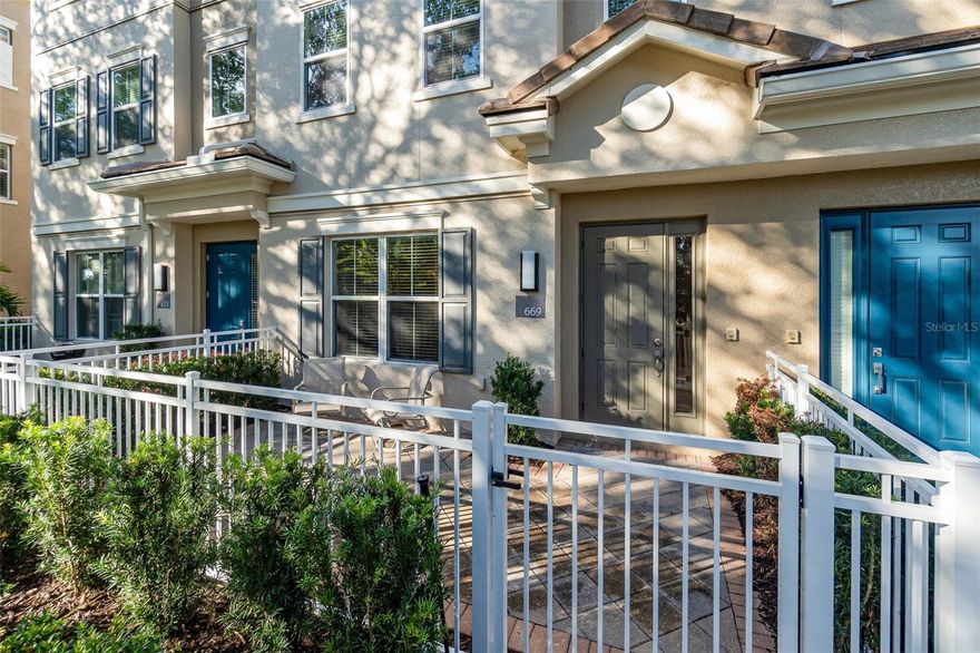 Welcome to this beautifully appointed 3-bedroom, 3.5- bath townhome in the highly sought-after gated community of Grande Oaks at Heathrow. Featuring an open-concept layout with elegant tray ceilings, this home offers a perfect blend of comfort, style and functionality. The spacious kitchen boasts wood cabinetry, granite countertops, stainless steel appliances-including a brand-new range, a large center island and a generous pantry. A private balcony is located just off the kitchen, creating the ideal space for morning coffee or outdoor dining.  The adjoining dining room provides an effortless flow for entertaining. The third-floor primary suite includes a large bedroom retreat, a well-appointed bathroom with stand-alone over-size shower, dual sinks, two linen closets and a spacious walk-in closet. A versatile second bedroom on the same floor is perfect for a home office, fitness room, or hobby room. The first floor features a third bedroom with a full bathroom and built-in closet, perfect for a guest space.  Additional conveniences include a first-floor laundry room, complete with washer and dryer, and access to a rear-facing 2-car garage. Residents of Grande Oaks at Heathrow offers resort-style amenities, including a clubhouse, pool and spa, fitness center, playground and basic cable- soon to be upgraded to fiber internet in January. The community has recently undergone extensive exterior updates, including a new roof, new energy-efficient windows, new balcony, new stucco, new exterior paint, updated railings, gutters, downspouts, and refreshed landscaping. Located next to Colonial Town Park, you'll enjoy immediate access to restaurants, shops, a movie theatre, grocery options and more. with I-4 and 417, commuting and travel are a breeze. This impeccably maintained townhome is move-in ready and offers an exceptional lifestyle in one of the area's most convenient locations.