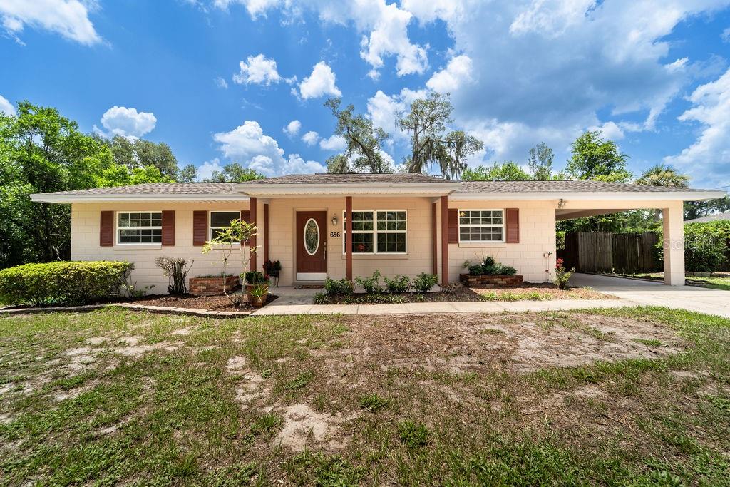 Photo of 686 E Kentucky Avenue, Deland, FL 32724 (MLS # V4950344)