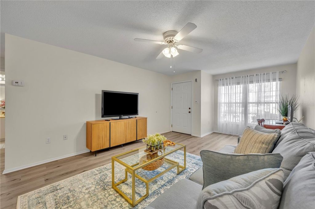 Photo of 221 Esplanade Way #105, Casselberry, FL 32707 (MLS # O6366657)