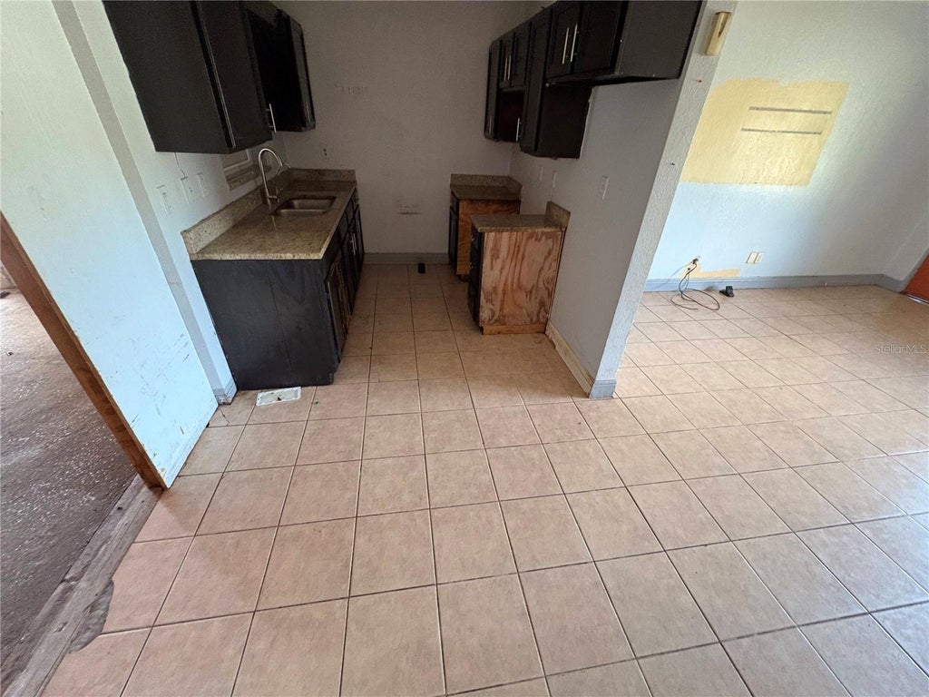 Photo of 7130 Lakner Way, Orlando, FL 32822 (MLS # O6451938)