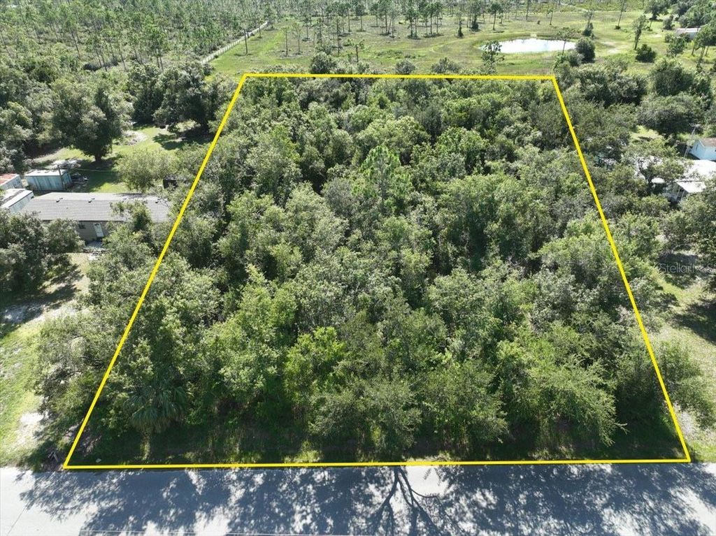 Photo of 5741 Swaying Palm Drive, Punta Gorda, FL 33982 (MLS # O6369875)