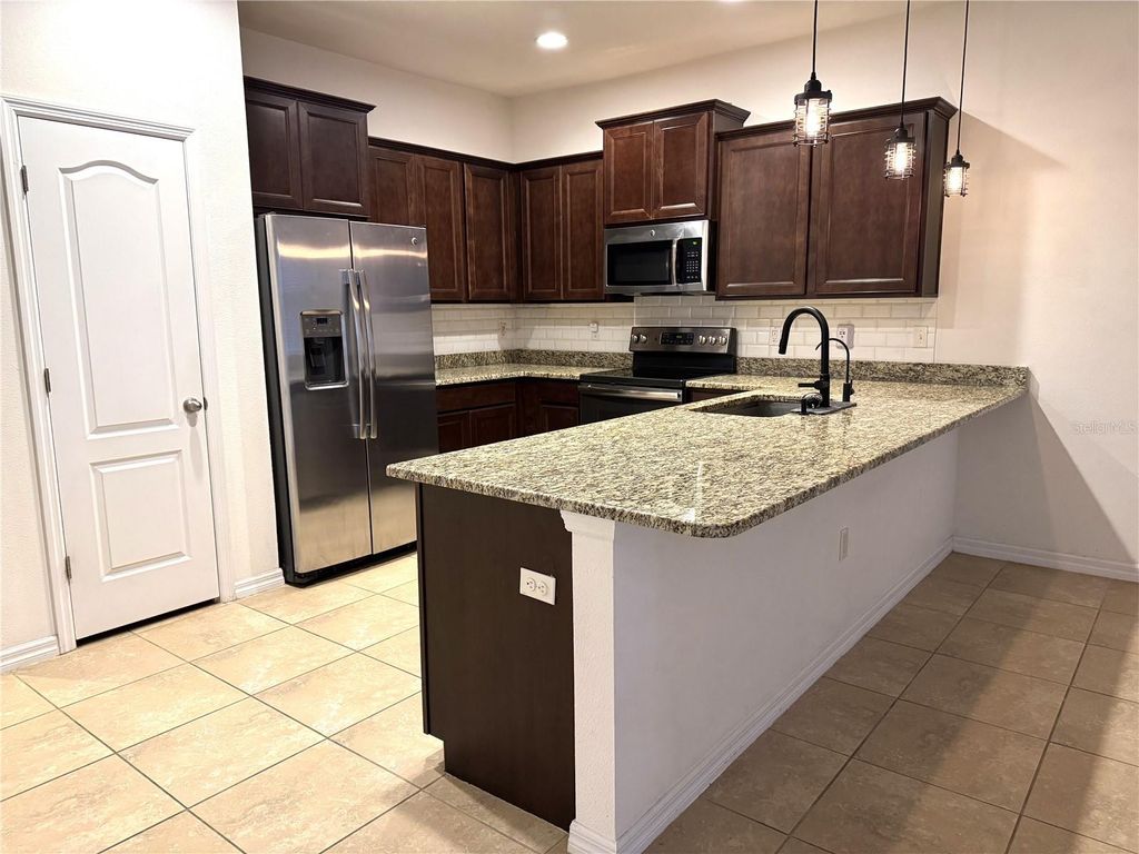 Photo of 3840 Silverlake Way, Wesley Chapel, FL 33544 (MLS # TB8473972)