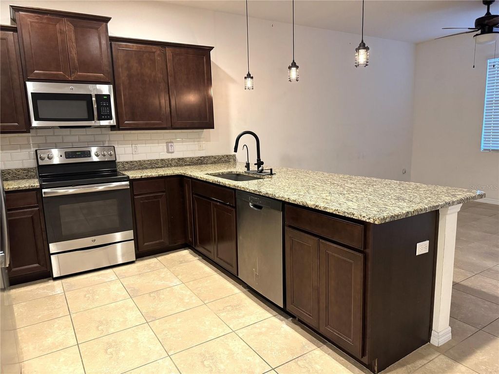 Photo of 3840 Silverlake Way, Wesley Chapel, FL 33544 (MLS # TB8473972)