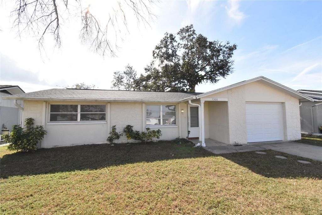 Photo of 7300 Embassy Boulevard, Port Richey, FL 34668 (MLS # C7517833)