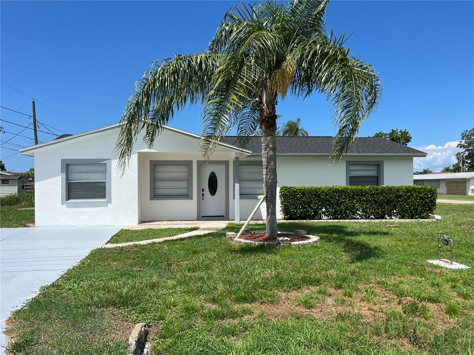 Welcome to this beautifully remodeled 3-bedroom, 2-bath home situated on a spacious corner lot in Palmetto. This move-in ready property offers a formal living room, formal dining room, and a comfortable family room, providing plenty of space for entertaining and everyday living. The brand-new kitchen features stylish cabinets, granite counter tops, and new appliances including refrigerator, stove, dishwasher, and microwave. Both bathrooms have been fully remodeled, and the home has been updated with modern light fixtures, ceiling fans, and fresh interior and exterior paint. Major improvements include a new roof (2025), new A/C system, and a new water heater. An inside laundry room and a covered screened porch add to the home’s functionality, while the large corner lot and driveway provide plenty of outdoor and parking space. With all the major upgrades already completed, this spacious home is truly move-in ready and waiting for its new owner.
