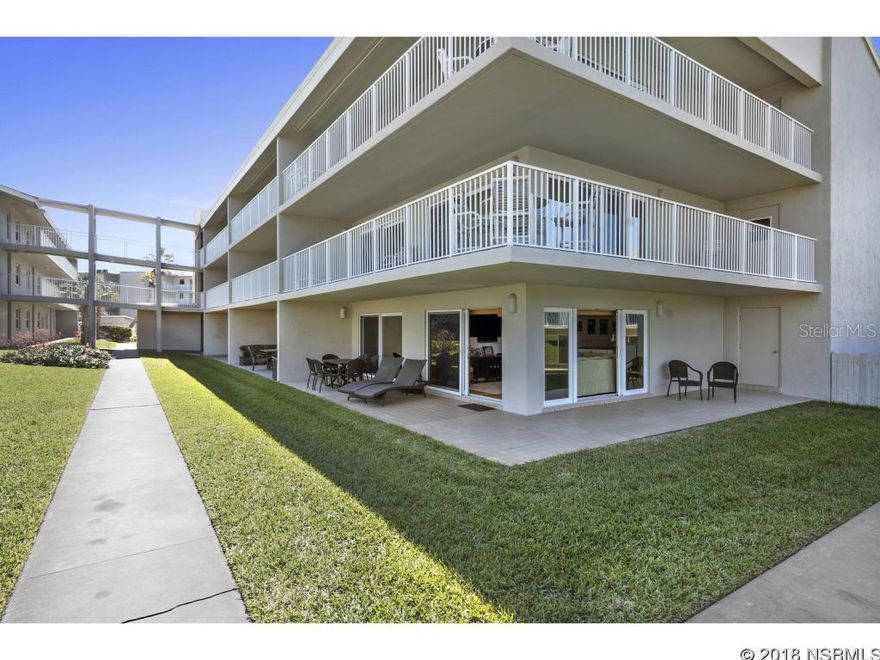 SPECTACULAR!!! Rarely Available Corner Ground Floor Residence. Enjoy the Ocean Breezes and Ocean View from your wrap around patio in this direct ocean-front complex. Inside you will be amazed at the level of detail included in this fully renovated home. Glass Cook Top, Built-In Oven, Refrigerator and additional under-counter wine/beverage refrigerator. Custom Cabinetry with Enormous Granite Topped Island/Dining Table, Tons of Storage. Custom Millwork throughout. New Refrigerator. Freshly Painted. Three Bedrooms and Two Fully Renovated Bathrooms. The Master Suite includes walk-in closet and gorgeous bathroom. Schooner Point is one of the few complexes that offers parking for owner's boats. Heated Pool, BBQ area and private Dune Walk-Over to NSB's NO DRIVE BEACH. A Picture Paints a Thousand Words - so be sure to check out the Photos and Virtual Tour! All Dimensions are approximate and subject to Buyer's verification. ;LocationDescription: Condo ;Water: City