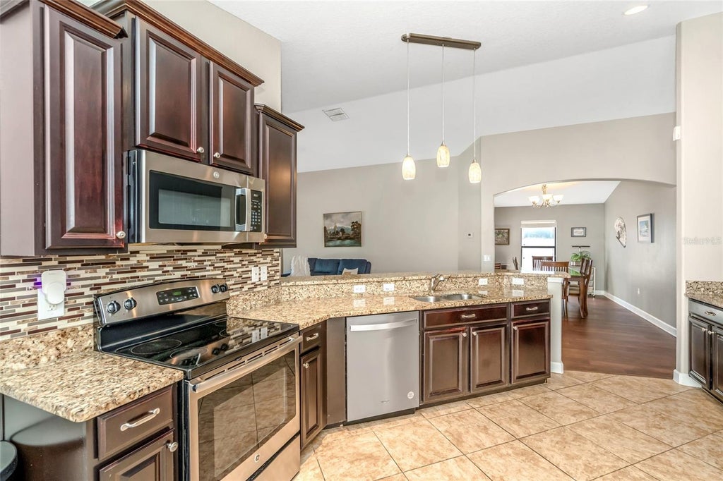 Photo of 12539 Mountain Springs Place, New Port Richey, FL 34655 (MLS # TB8557342)