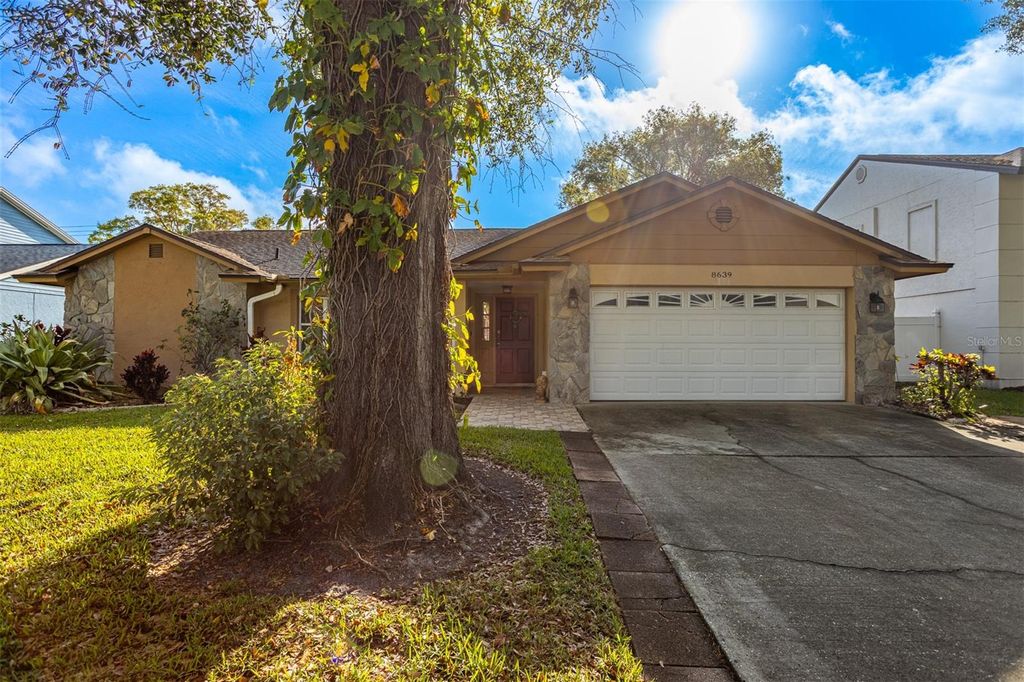 Photo of 8639 Leighton Drive, Tampa, FL 33614 (MLS # TB8489060)