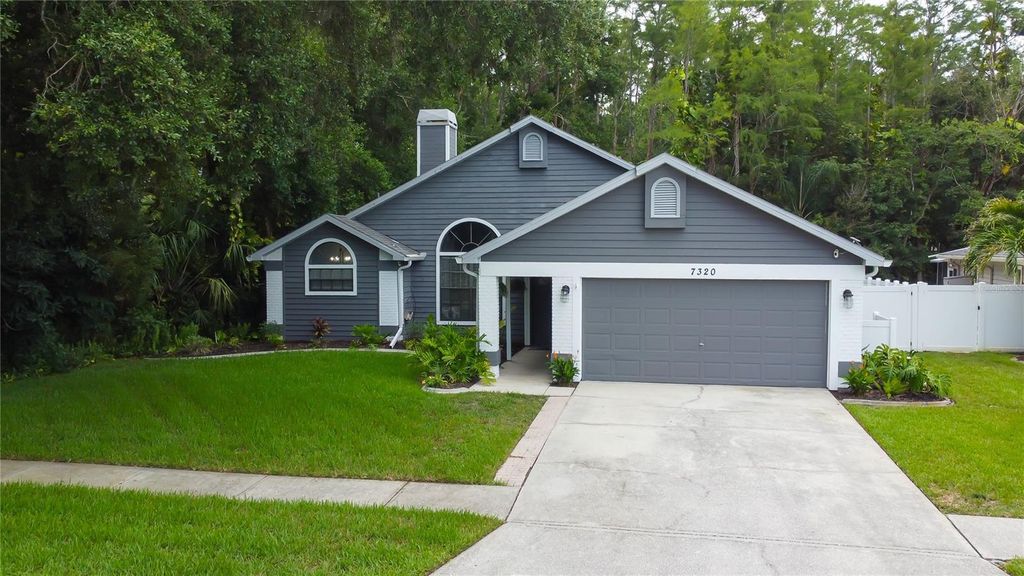 Photo of 7320 Hideaway Trail, New Port Richey, FL 34655 (MLS # TB8478277)