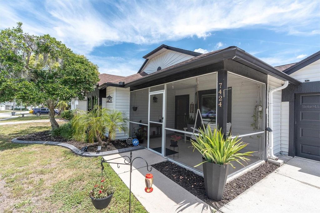 Photo of 7424 Swan Lake Drive, New Port Richey, FL 34655 (MLS # TB8497906)