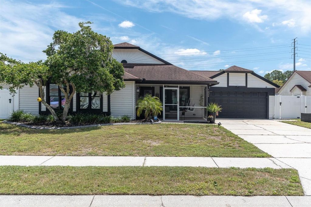 Photo of 7424 Swan Lake Drive, New Port Richey, FL 34655 (MLS # TB8497906)