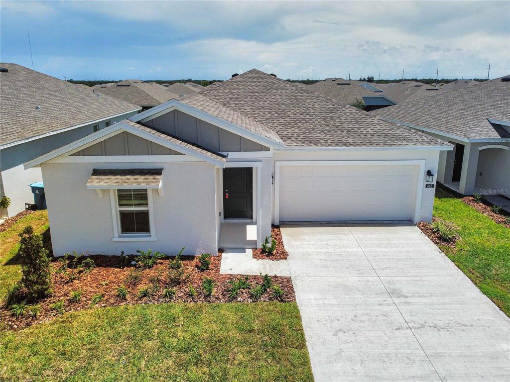 Photo of 668 Sand Pine Lane, Haines City, FL 33844 (MLS # S5137233)